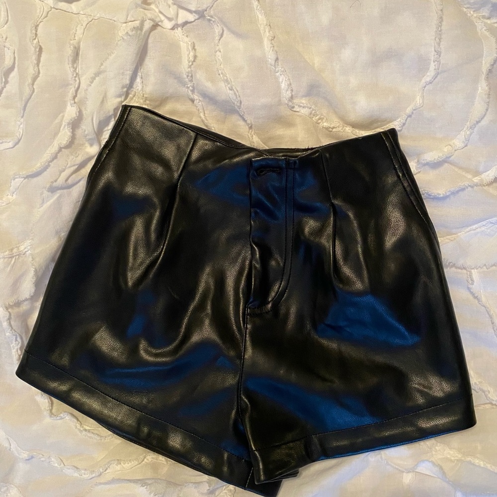 Black faux leather shorts